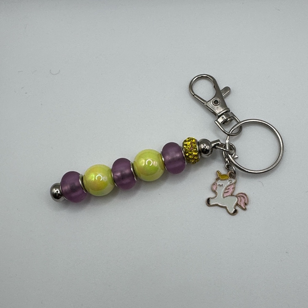 Addie’s Bag Charms Purple and Yellow with Unicorn Charm